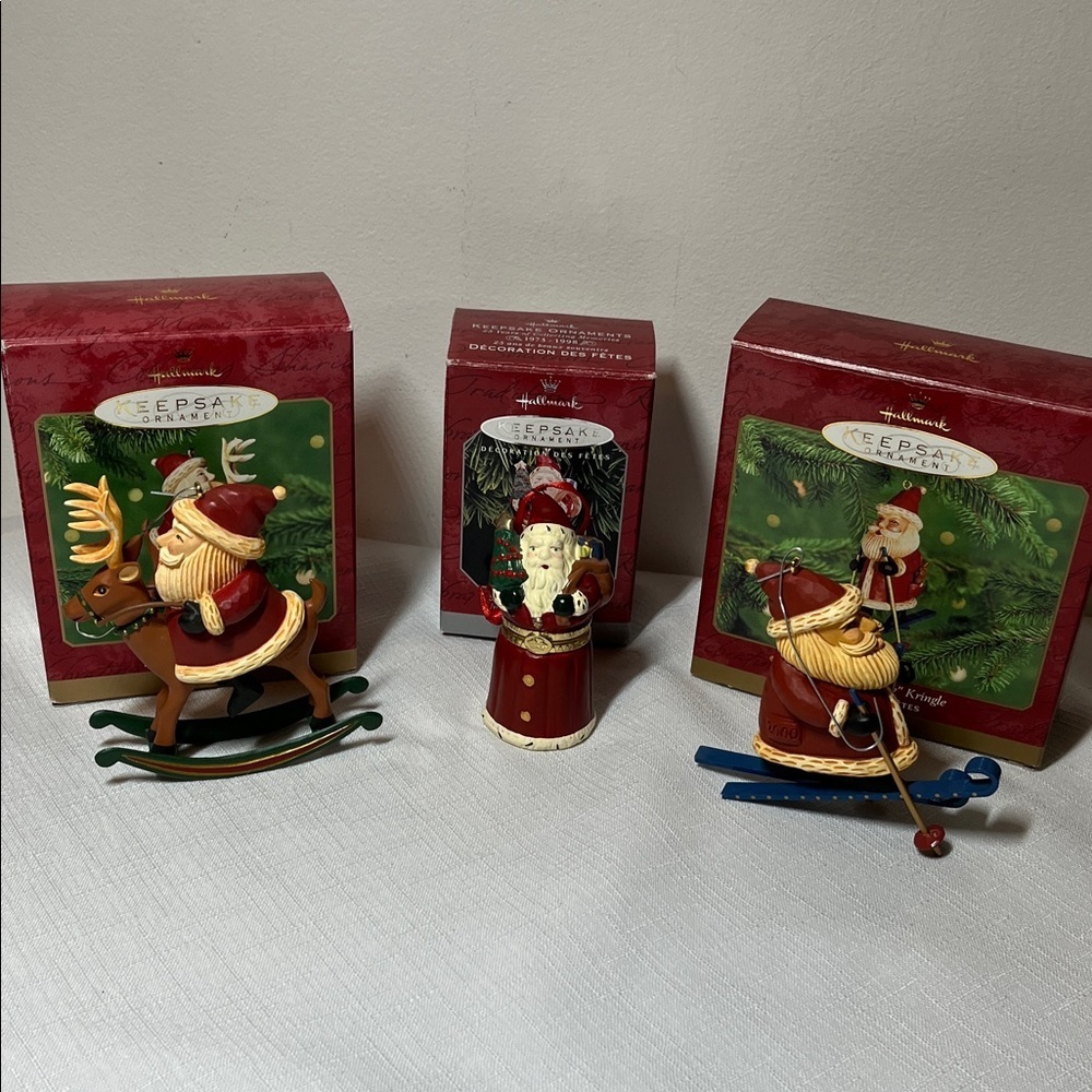 Hallmark Keepsake Santa Ornament Trio collectible. Festive.